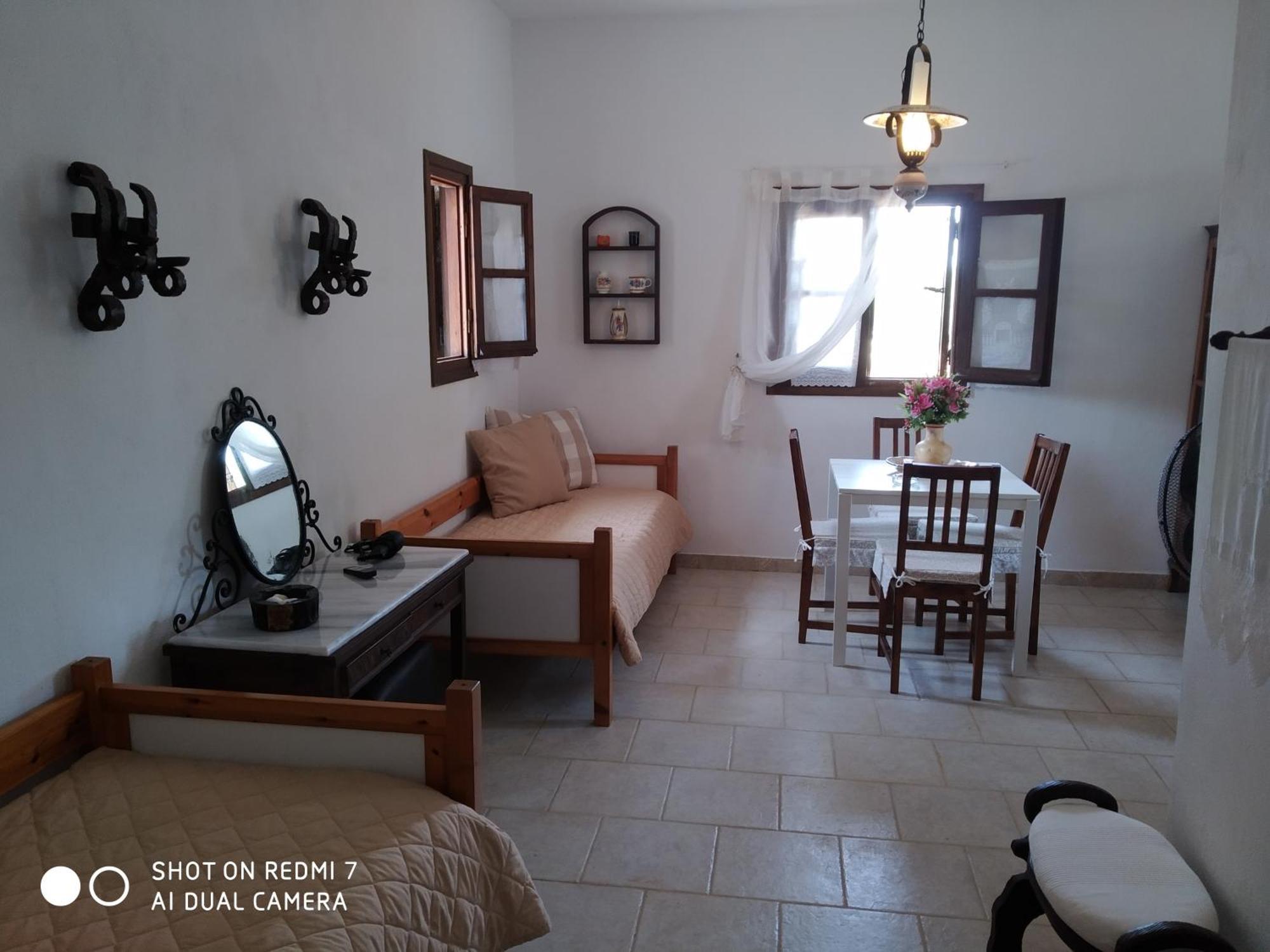 Apartment Charouda Stone Tower Xenonas
